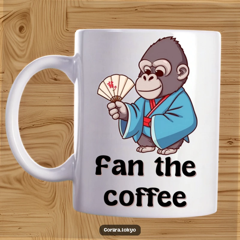 Funny mug showing a gorilla in a blue formal kimono gracefully holding a delicate fan with a serene expression.