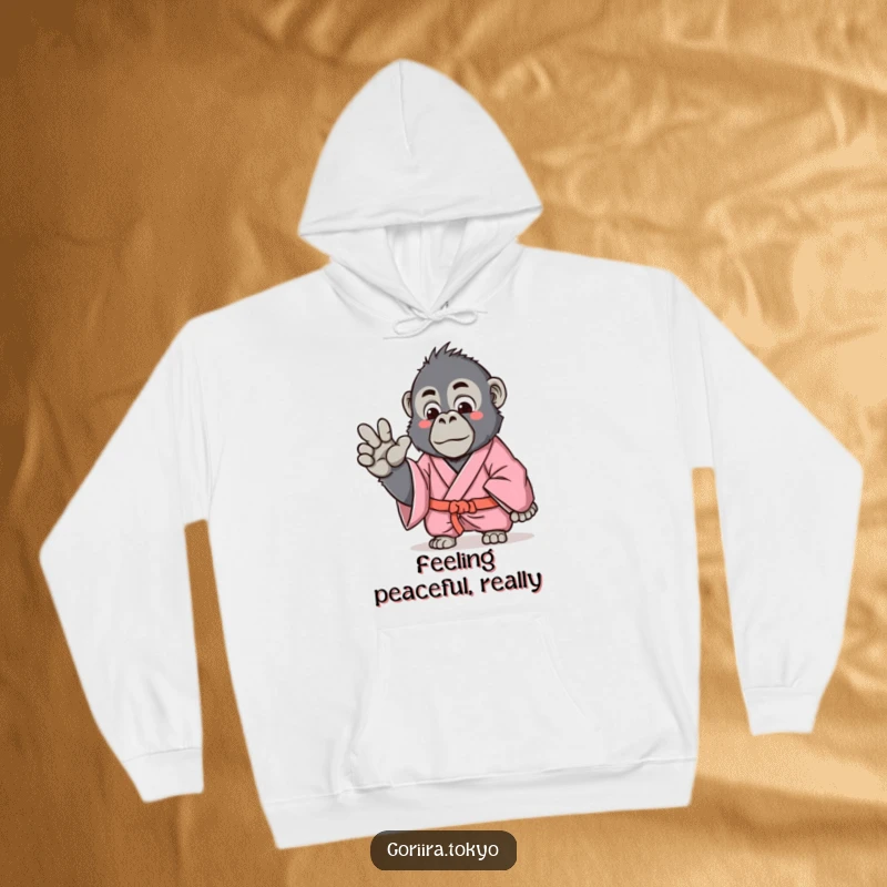 Funny Gorilla Hoodie featuring a gorilla in a pink kimono making a gentle hand gesture, offering warmth and a humorous vibe.