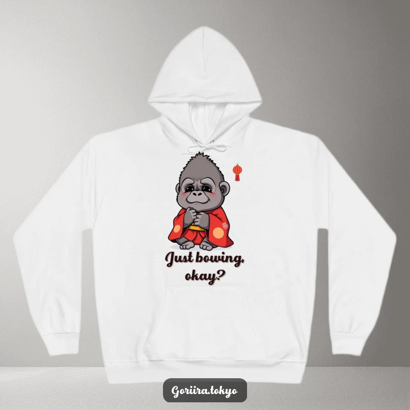 Funny hoodie design: a small, cute gorilla dressed in a vibrant red kimono, performing a polite bow.